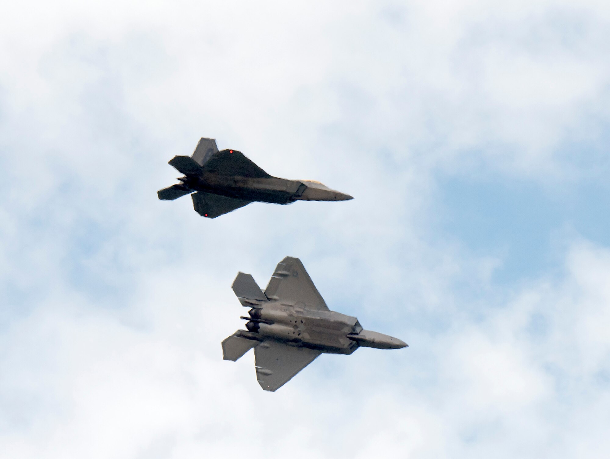 F-22 Raptor fighters arrive at Wright-Patterson Air Force Base, Ohio, Aug. 23, 2020. The planes, belonging to the 325th Fighter Wing, Eglin AFB, Fla., evacuated to Wright-Patterson to avoid Hurricane Marco and Tropical Storm Laura which are approaching the U.S. gulf coast. (U.S. Air Force photo by R.J. Oriez)