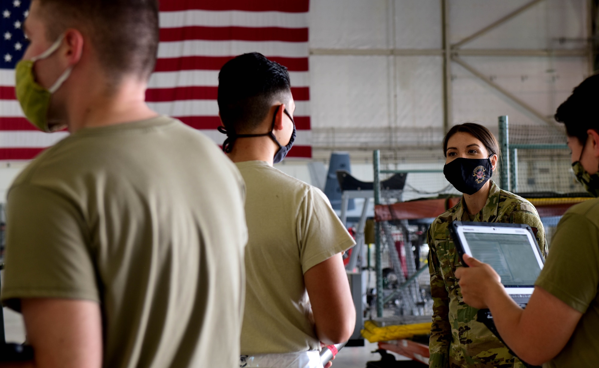 Capt. Jennifer speaks to maintenance Airmen.