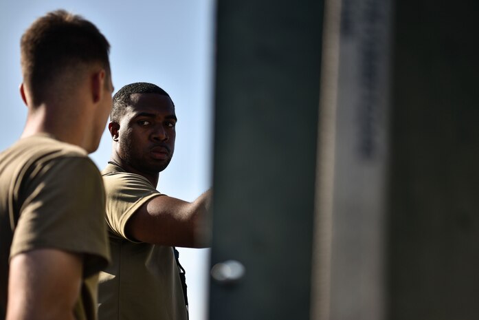 A photo of Airmen securing chaff and flares.