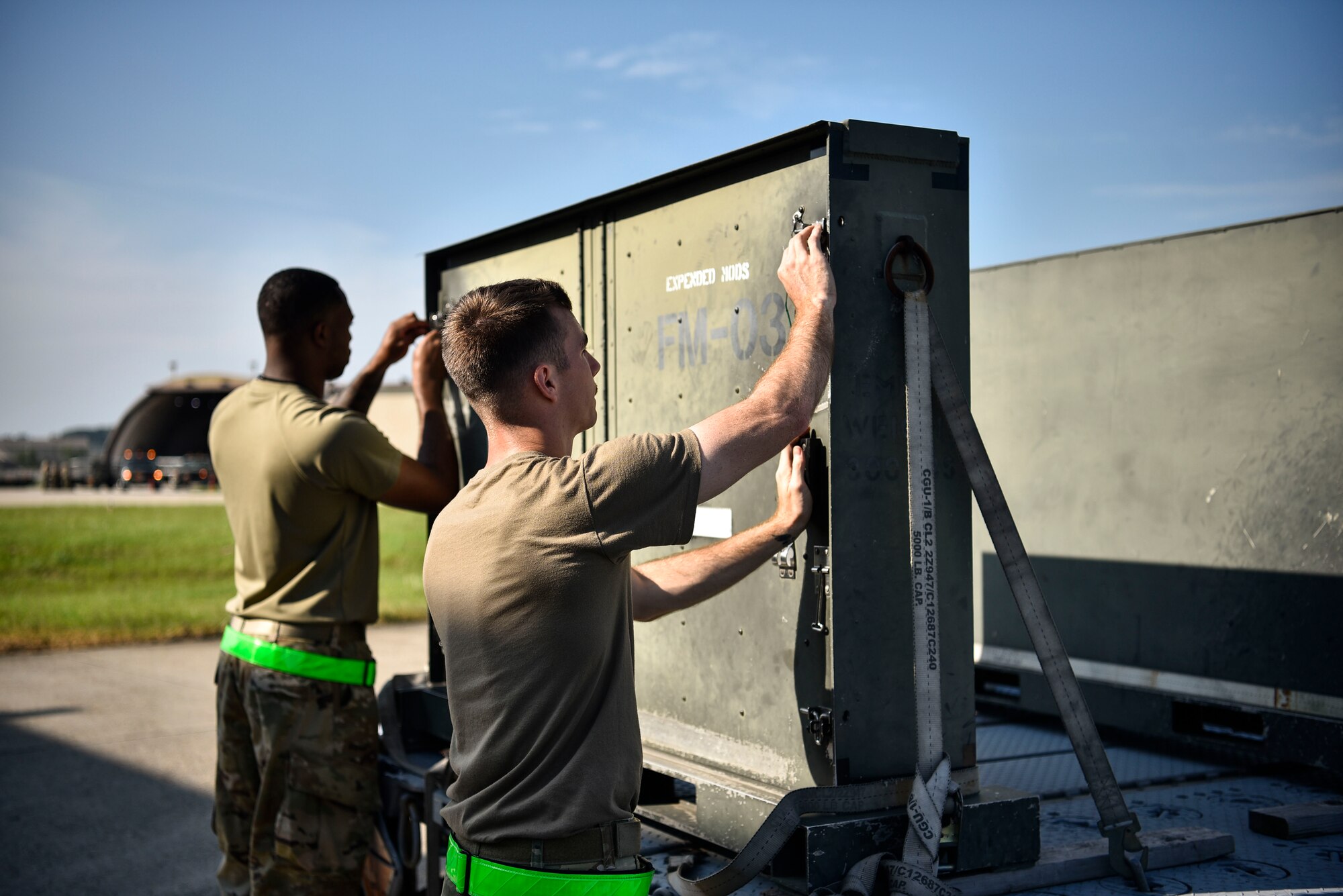 A photo of Airmen securing chaff and flares.