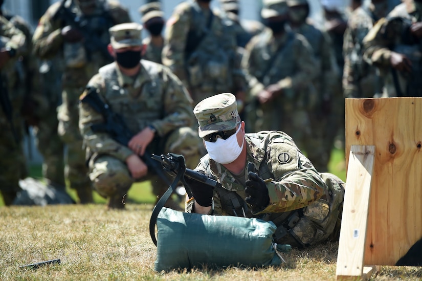 U.S. Army Reserve Sgt. 1st Class Eric Monson, observer coach/trainer assigned to the 1st Battalion, 383rd Regiment in Des Moines, Iowa, conducts a demonstration during Table 3 of the new Army Individual Weapons Qualification standards that will take effect on October 1, 2020.