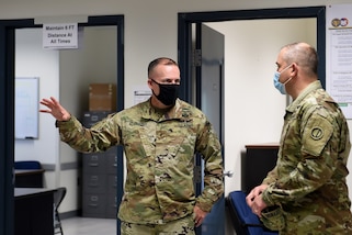 Brig. Gen. Walter Duzzny, left, commanding general of the 78th Training Division, meets with Brig. Gen. Ernest Litynski, commanding general of the 85th U.S. Army Reserve Support Command, during Operation Ready Warrior exercise, at Fort McCoy, Wisconsin, August 22, 2020.