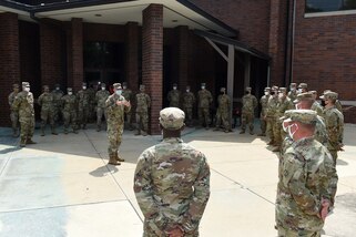 Brig. Gen. Ernest Litynski, commanding general of the 85th U.S. Army Reserve Support Command, meets with his observer coach/trainers, working under First Army’s 181st Multi-functional Training Brigade, during Operation Ready Warrior exercise, at Fort McCoy, Wisconsin, August 22, 2020.