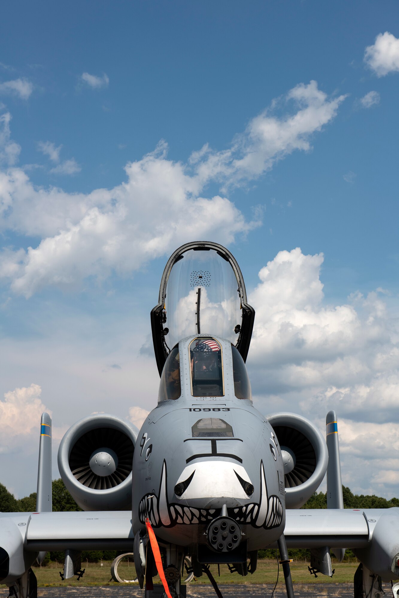 An aircraft sits on the flight line