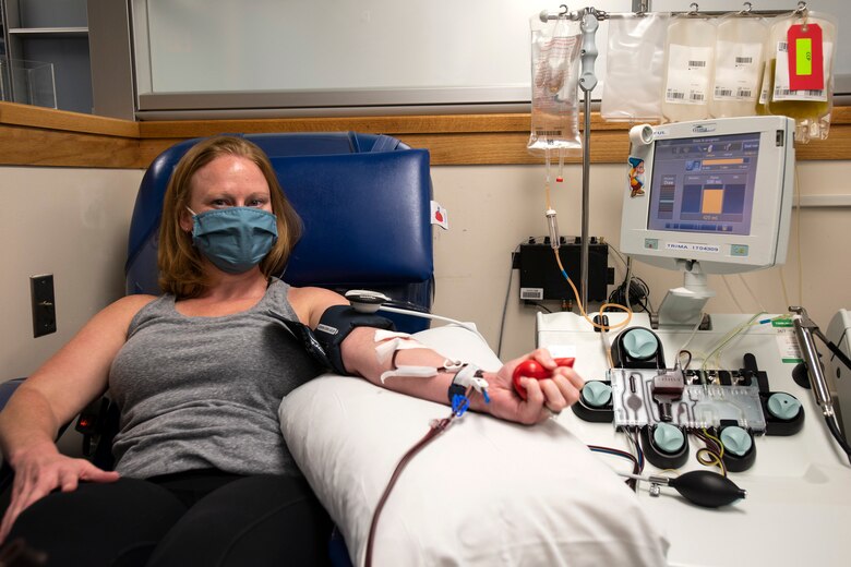 Megan Keller, a recovered COVID-19 patient, donates COVID-19 convalescent plasma Aug. 20, 2020, at the Armed Services Blood Bank Center, Joint Base San Antonio-Lackland, Texas. Patients that have recovered from COVID-19 have a higher chance of carrying a concentrated amount of antibodies in their plasma to help other patients that do not. (U.S. Air Force photo by Airman 1st Class Melody B. Bordeaux)