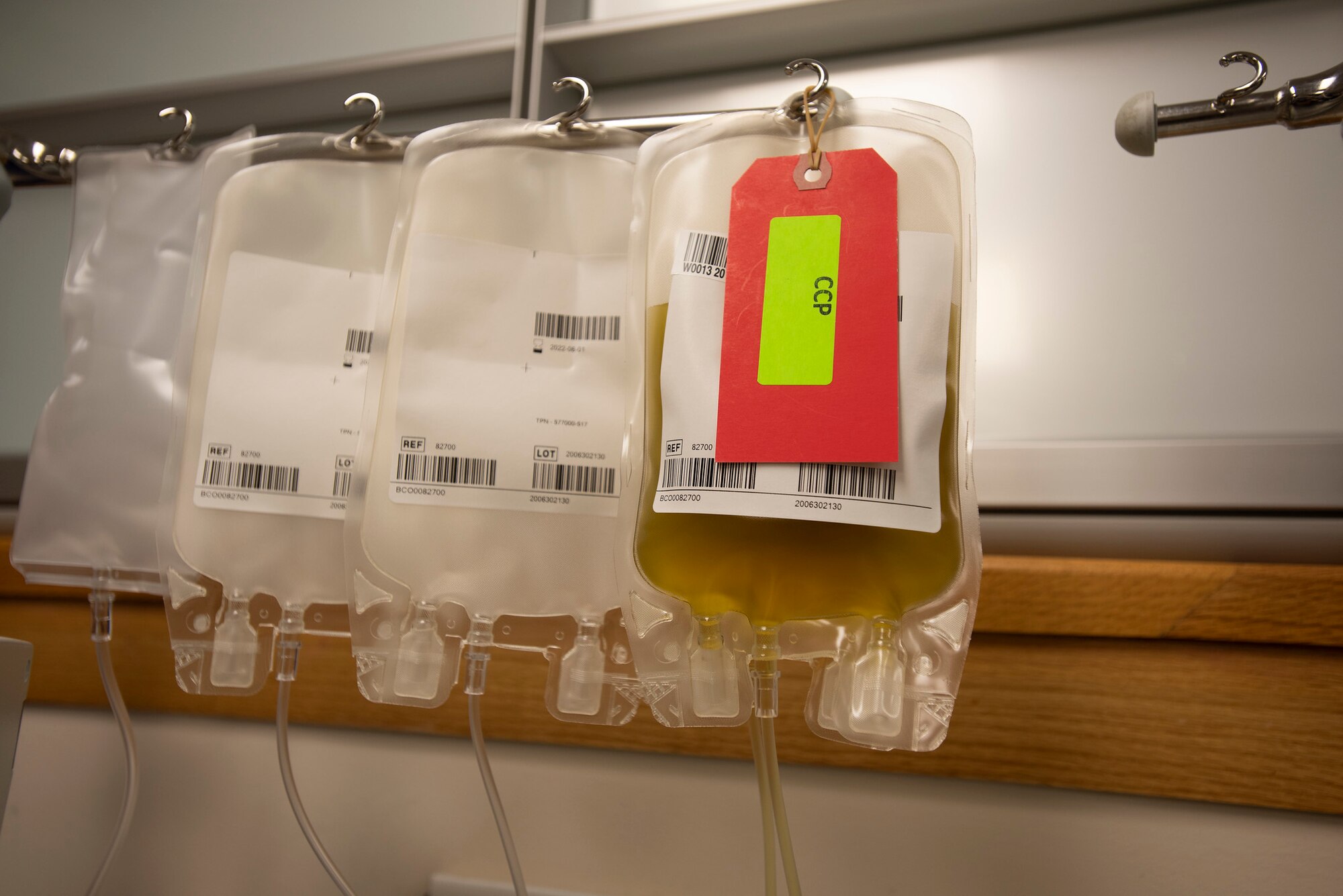 Bags collect COVID-19 convalescent plasma from a donor Aug. 20, 2020, at the Armed Services Blood Bank Center, Joint Base San Antonio-Lackland, Texas. The donor center has a goal of 34 units a week to prepare a stockpile before flu season. (U.S. Air Force photo by Airman 1st Class Melody B. Bordeaux)