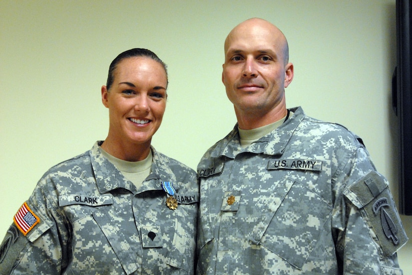Sgt. 1st Class Krists Clark and her husband Lt. Col. (P) Greg Clark