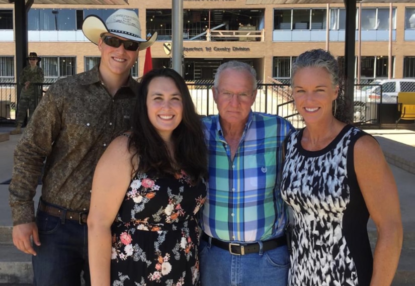 Sgt. 1st Class Kristi Clark with her father and two children.