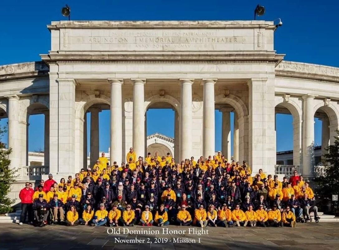 Veterans and Volunteers of Old Dominion Honor Flight pose for a group photo at Arlington National Cemetery, Nov. 2, 2019. (Photo courtesy of April Maletz.)