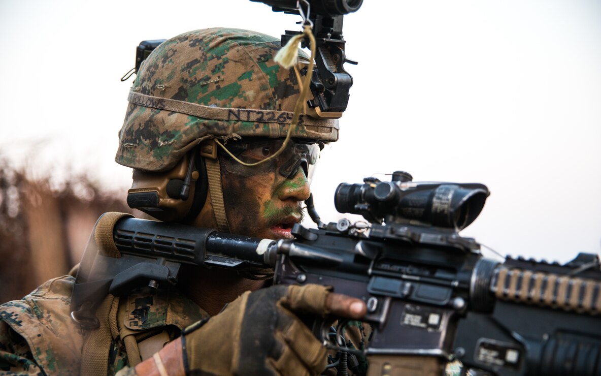 A U.S. Marine scans his sector of fire while conducting defensive operations during the Supersquad 2020 Competition at Marine Corps Base Camp Pendleton, Calif., Aug. 20.