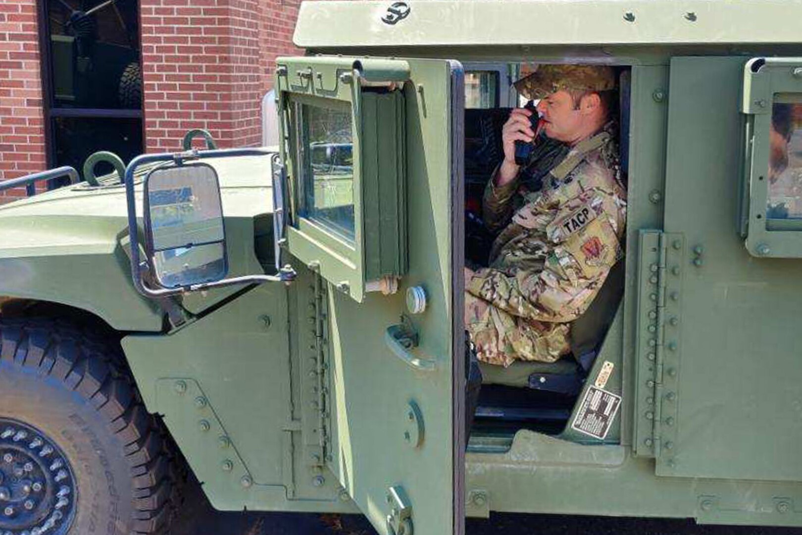 Airmen with the Louisiana National Guard's 122nd Air Support Operation Squadron conduct radio checks prior to leaving Camp Beauregard, Pineville, Louisiana, Aug. 24, 2020. 122nd ASOS teams provide enhanced radio and satellite communications for key locations to coordinate response efforts after natural disasters in Louisiana.