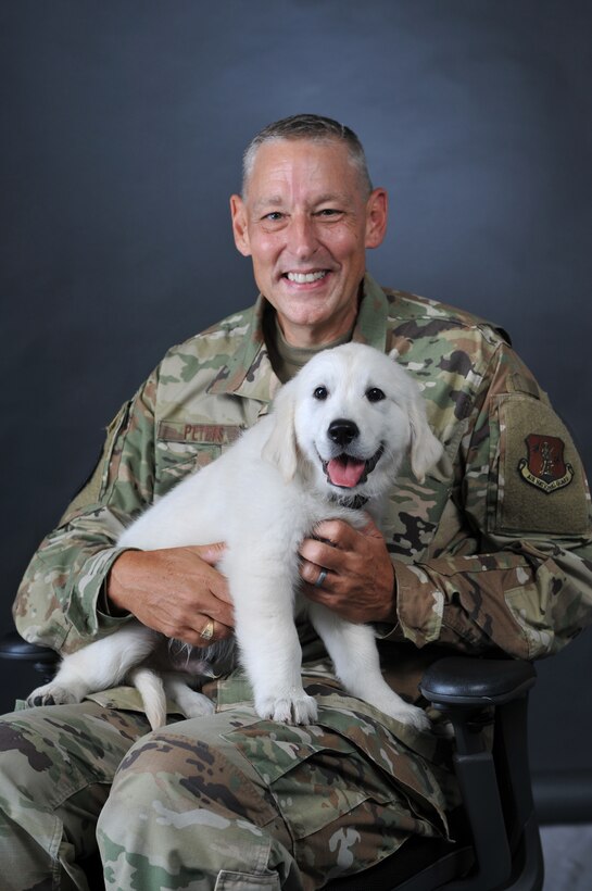 Lincoln, an English Cream Golden Retriever puppy is in training to become a full time therapy dog at the Iowa Air Guard’s 185th Air Refueling Wing in Sioux City, Iowa.