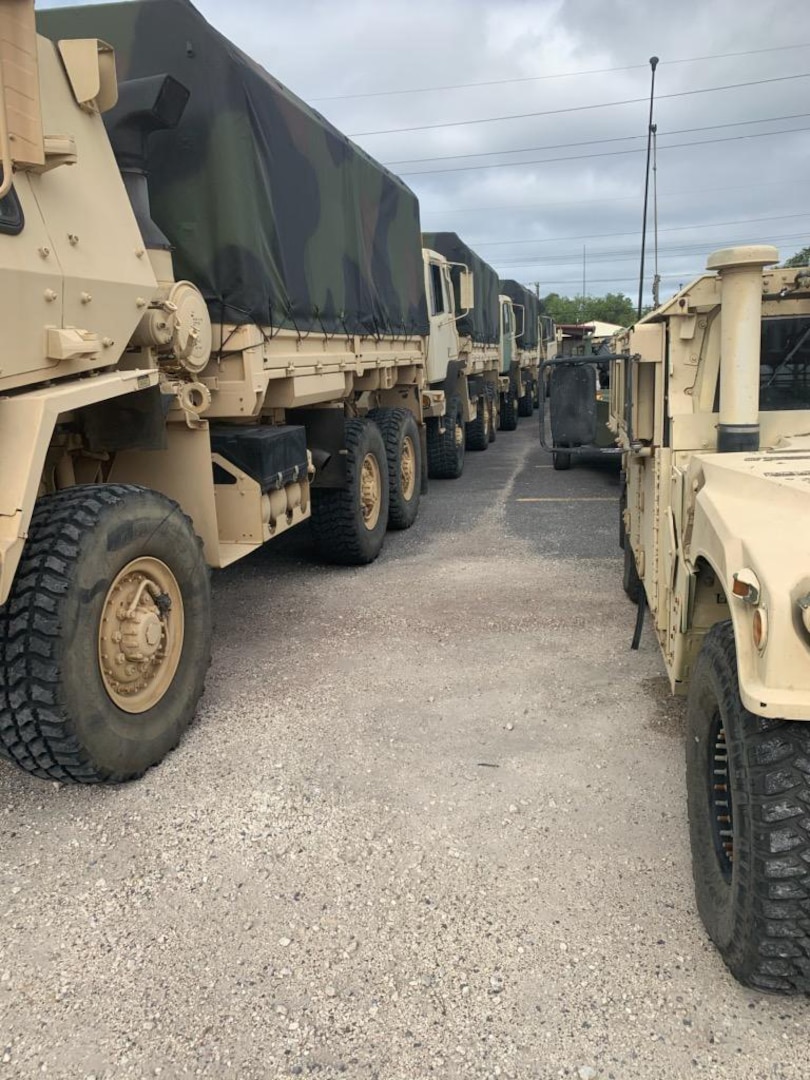 Louisiana National Guard members stage key equipment and Guard members in Lake Charles Aug. 25, 2020, to respond after Hurricane Laura makes landfall in southwest Louisiana.
