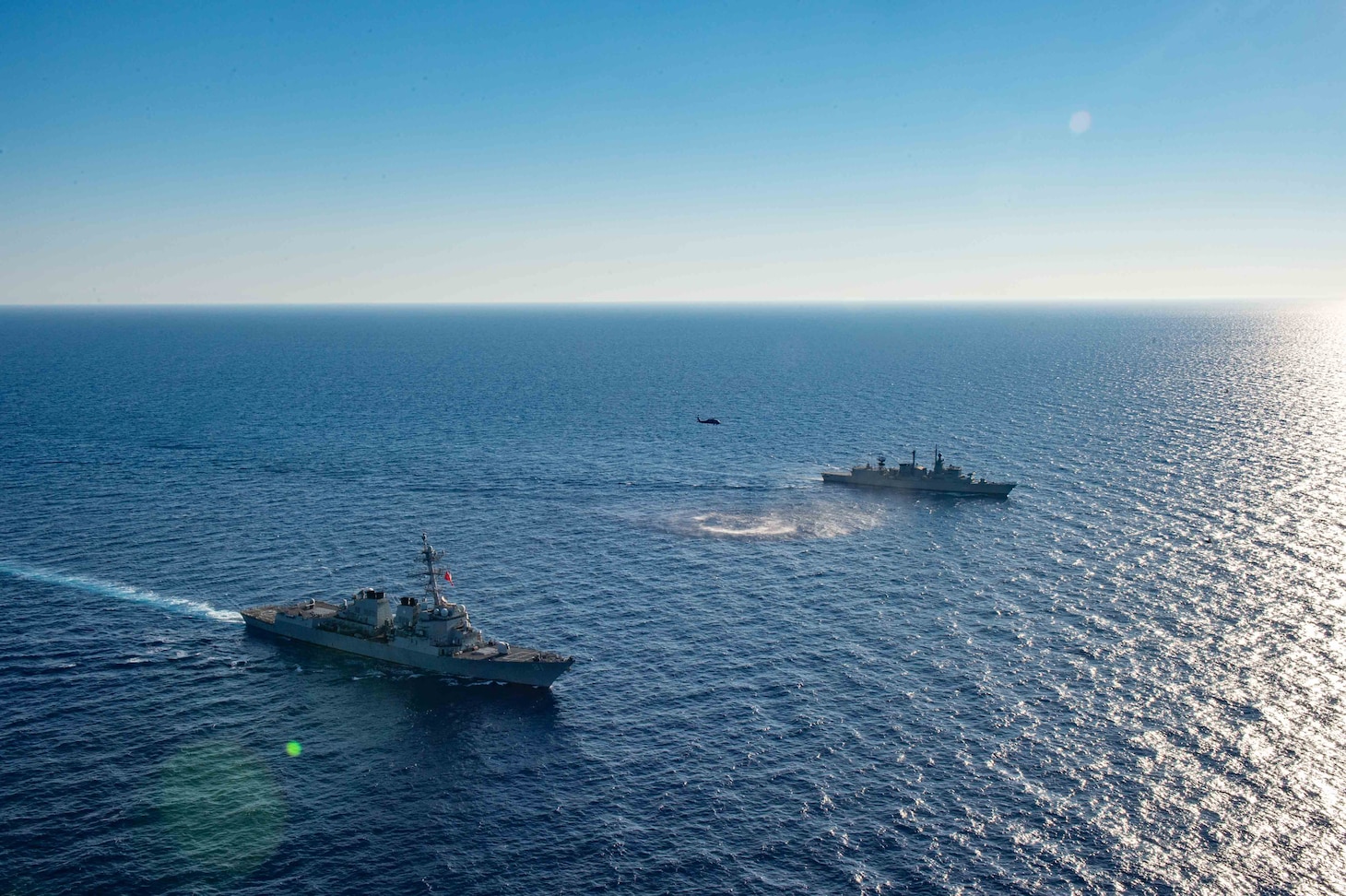 MEDITERRANEAN SEA (Aug. 24, 2020) The Arleigh Burke-class guided-missile destroyer USS Winston S. Churchill (DDG 81) executes maneuvering drills with Hellenic Navy frigate Aegean (F 460), Aug 24, 2020. Winston S. Churchill is deployed to the U.S. 6th Fleet area of operations in support of regional allies and partners and U.S. national security interests in Europe and Africa.