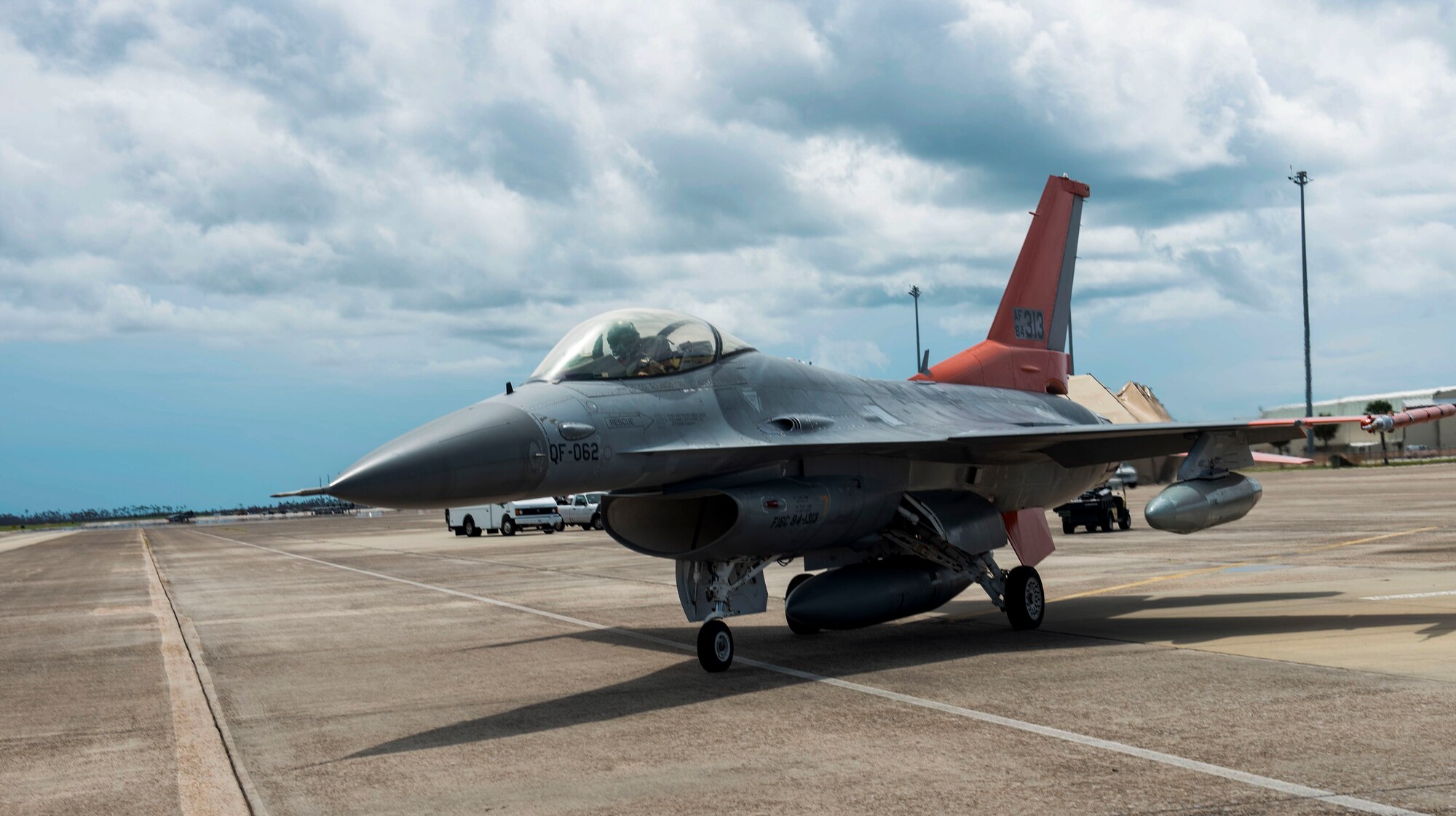 U.S. Air Force Lt. Col. Travis Winslow, 82nd Aerial Targets Squadron, commander, taxies a QF-16 aircraft for takeoff at Tyndall Air Force Base, Florida, Aug. 21, 2020. Wilson piloted the aircraft to Shaw Air Force Base, South Carolina, as part of an airfield evacuation in preparation for severe weather conditions. (U.S. Air Force photo by Staff Sgt. Magen M. Reeves)