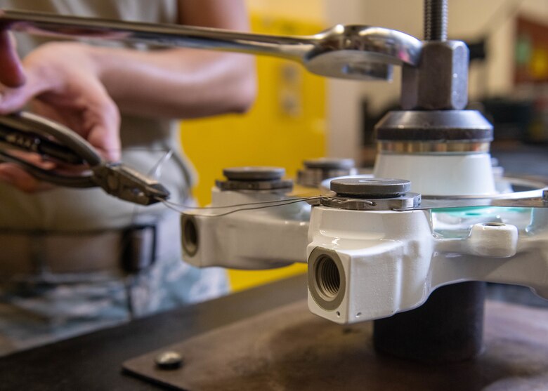 Hydraulics Airman assembles F-16 brake