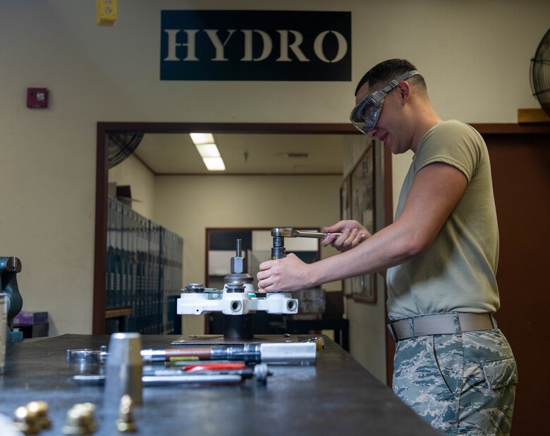 Hydraulics Airman assembles F-16 brake
