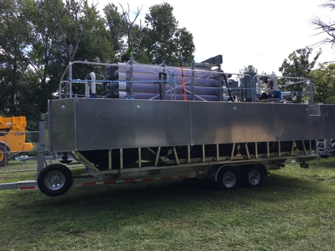 U.S. Army Engineer Research and Development Center (ERDC) researchers stage a mobile dissolved air flotation system at Chautauqua Lake, New York, ahead of the Harmful Algal Bloom Interception, Treatment, and Transformation System 2020 research demonstration. The ERDC and scientists from New York State Department of Environmental Conservation are collaborating with industry partners to study harmful algal bloom mitigation technology in Chautauqua Lake from Aug. 19 through Sept. 4.