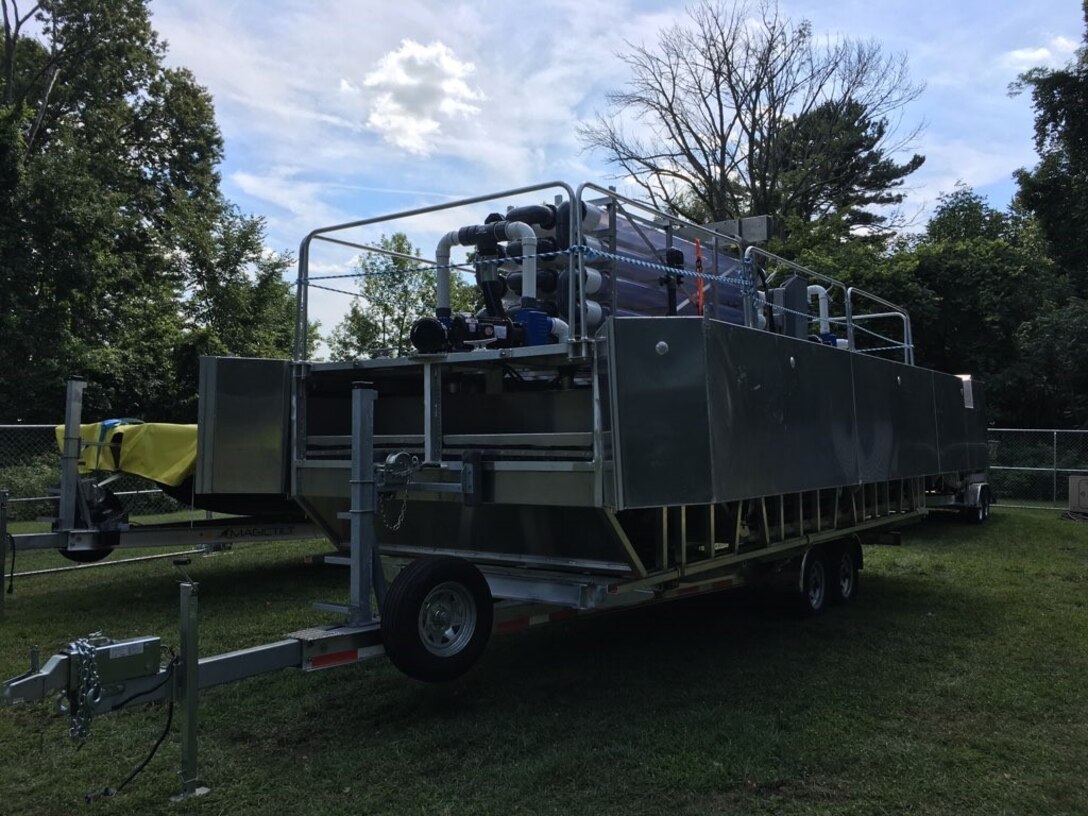 U.S. Army Engineer Research and Development Center (ERDC) researchers stage a mobile dissolved air flotation system at Chautauqua Lake, New York, ahead of the Harmful Algal Bloom Interception, Treatment, and Transformation System 2020 research demonstration. The ERDC and scientists from New York State Department of Environmental Conservation are collaborating with industry partners to study harmful algal bloom mitigation technology in Chautauqua Lake from Aug. 19 through Sept. 4.