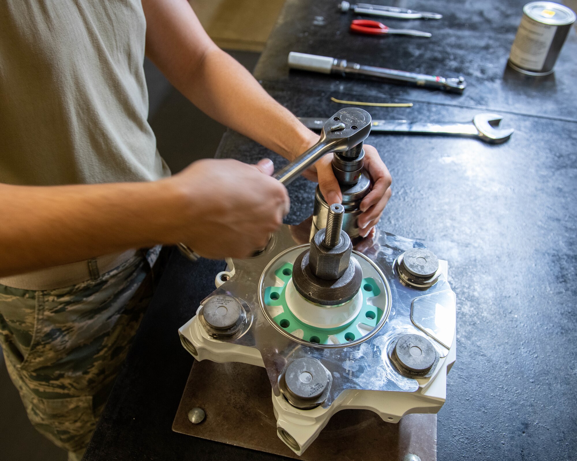 Hydraulics Airman assembles F-16 brake