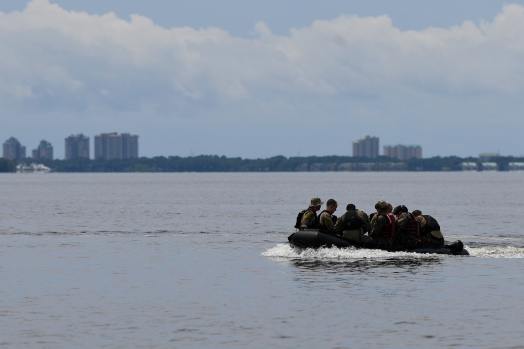 image of air force special tactics operators on a rigged alternate method boat during training.