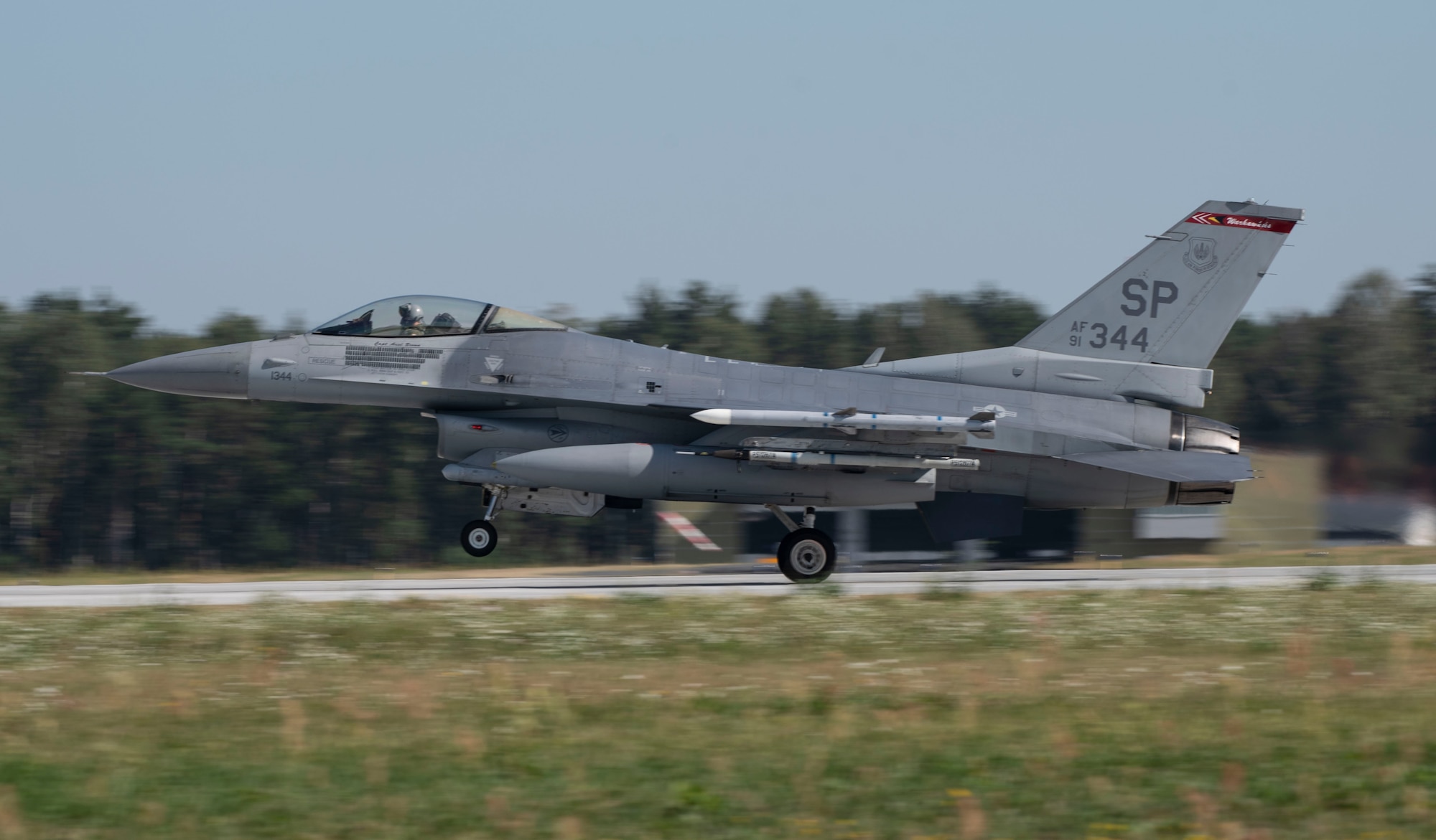 An Air Force F-16 Fighting Falcon, assigned to the 480th Expeditionary Fighter Squadron, takes off at Łask Air Base, Poland, August 20, 2020. The 480th FS, 52nd Fighter Wing, was welcomed by the 32nd Tactical Air Base for participation in Aviation Detachment Rotation 20.4, where both U.S. and Polish Allies shared perspectives, strengthened partnerships and maintained deterrence capabilities. (U.S. Air Force photo by Senior Airman Melody W. Howley)