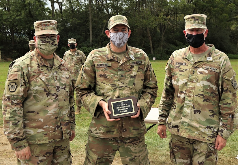 Approximately 50 Pennsylvania National Guard Soldiers and Airmen competed with rifles and pistols in multiple courses of fire to during The Adjutant General’s (TAG) Combined-Arms Match at Fort Indiantown Gap, Pa., Aug. 21-23. The combined-arms individual overall champion was Army Sgt. Jason Goodling, standing with Maj. Gen. Anthony Carrelli, Pennsylvania’s adjutant general, and Maj. Gen. Mark Schindler, deputy adjutant general-Army. Goodling was also the top finisher in the Governor’s Twenty competition this year. (U.S. Army National Guard photo by Staff Sgt. Zane Craig)