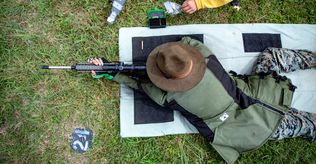 A U.S. Marine is sighting in during the 59th Annual Interservice Rifle Championship hosted by Weapons Training Battalion on Marine Corps Base Quantico, Va., Aug. 18.