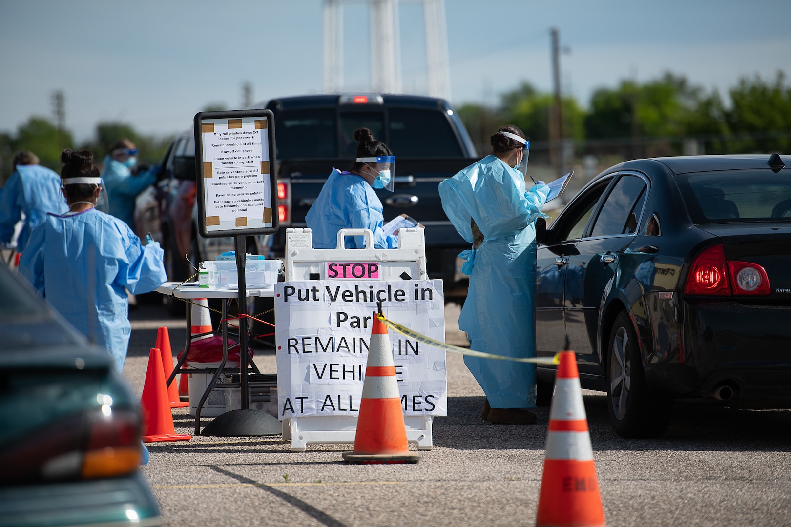 Oklahoma Army and Air National Guardsmen, under direction of Oklahoma Governor Kevin Stitt and alongside healthcare workers from the Oklahoma State Department of Health, help conduct COVID-19 testing at the Texas County Activity Center in Guymon, Oklahoma, May 16, 2020. As of May 19, 2020, Guymon had 650 confirmed cases of COVID-19, making it second in the total number of cases in Oklahoma. Oklahoma City, which has the highest number of COVID-19 cases, has the largest population of any city in Oklahoma, Guymon is 40th. The testing site was the first in the hotspot city to be open to all residents and not just those with doctor referrals. (Oklahoma Air National Guard photo by Tech. Sgt. Kasey M. Phipps)