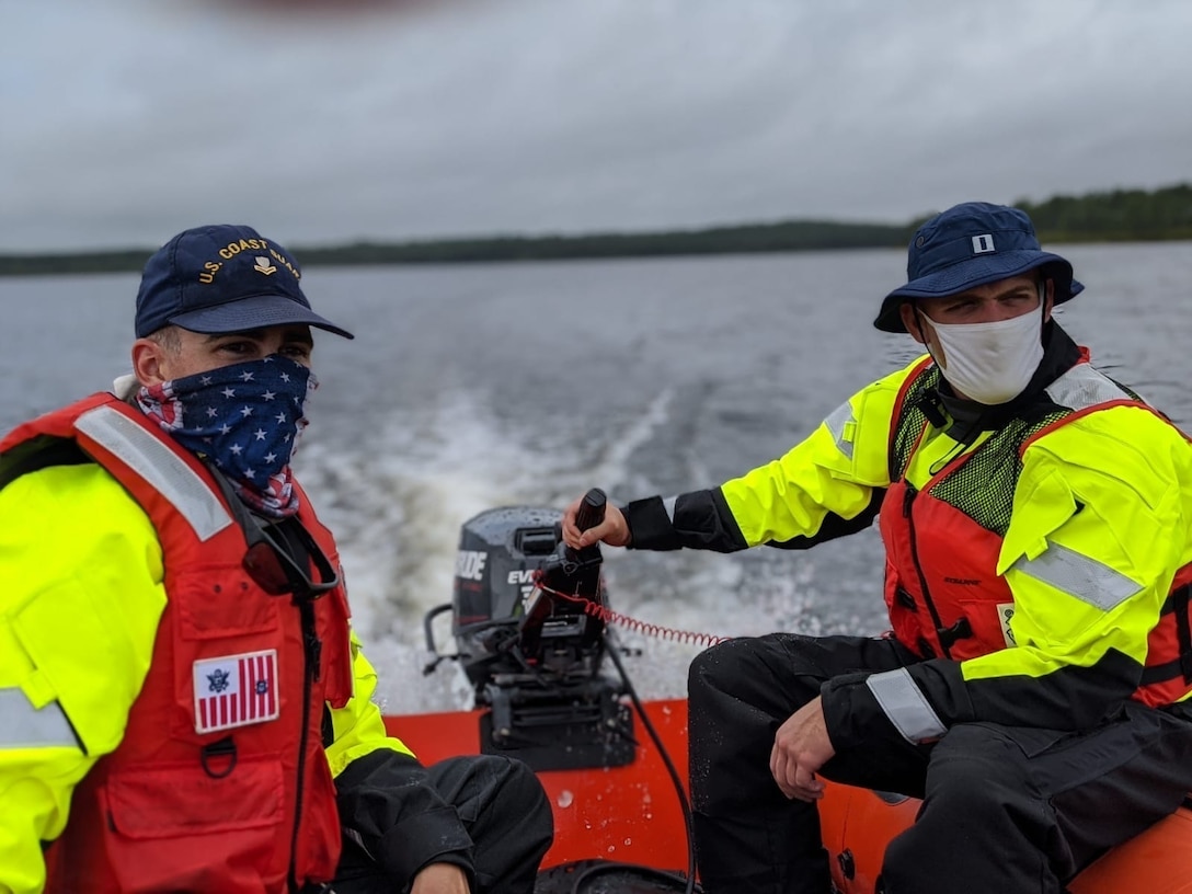 Petty Officer 2nd Class Tyler Vance, a boatswain’s mate with Coast Guard Maritime Safety and Security Team New Orleans, and Lt. Tim Dion, also with MSST New Orleans, conduct training in preparation for response operations during Hurricane Laura, near Mobile, Alabama, August 25, 2020. The units are qualified to conduct search-and-rescue operations as well as port security.