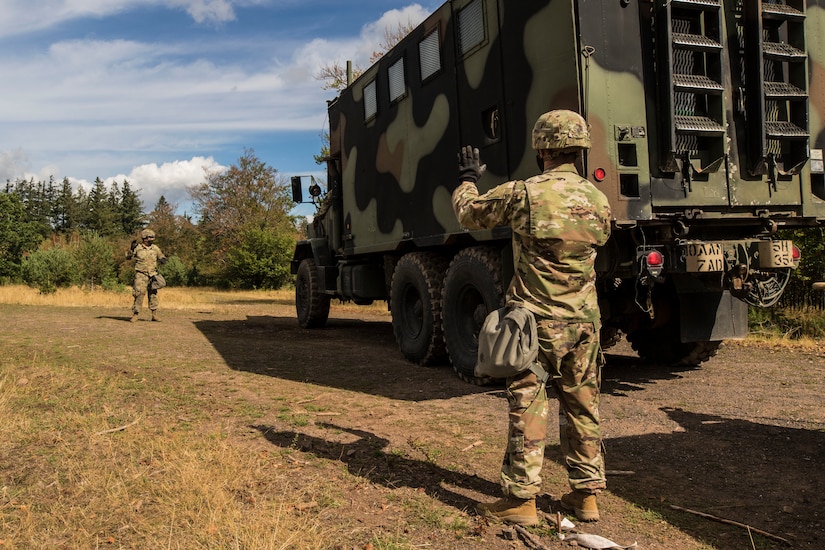 Swedish soldiers, assigned to the Air Defence Regiment, visit U.S. Soldiers assigned to the 5th Battalion, 7th Air Defense Artillery Regiment, 10th Army Air and Missile Defense Command, in Baumholder training Area, Germany