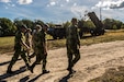Swedish soldiers, assigned to the Air Defence Regiment, visit U.S. Soldiers assigned to the 5th Battalion, 7th Air Defense Artillery Regiment, 10th Army Air and Missile Defense Command, in Baumholder training Area, Germany