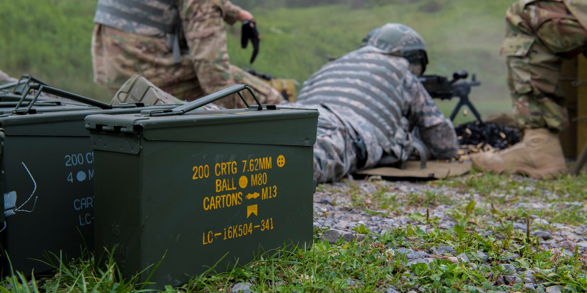 Senior Airmen Michael Rable, 911th Security Forces Squadron fire team member, fires the M240B machine gun at Camp Dawson, West Virginia, Aug. 11, 2020.