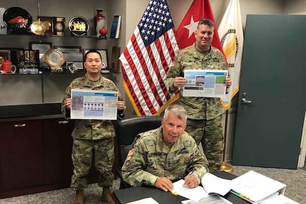 Lt. Gen. Todd Semonite, chief of engineers and U.S. Army Corps of Engineers commanding general, signs a Chief’s Report for the North Landing Bridge Replacement Study at headquarters in Washington, Aug. 25, 2020. The report’s signing allows for start of the Preconstruction Engineering and Design phase. The bridge connects the cities of Chesapeake and Virginia Beach, Virginia. (U.S. Army photo/Randie Gibson)