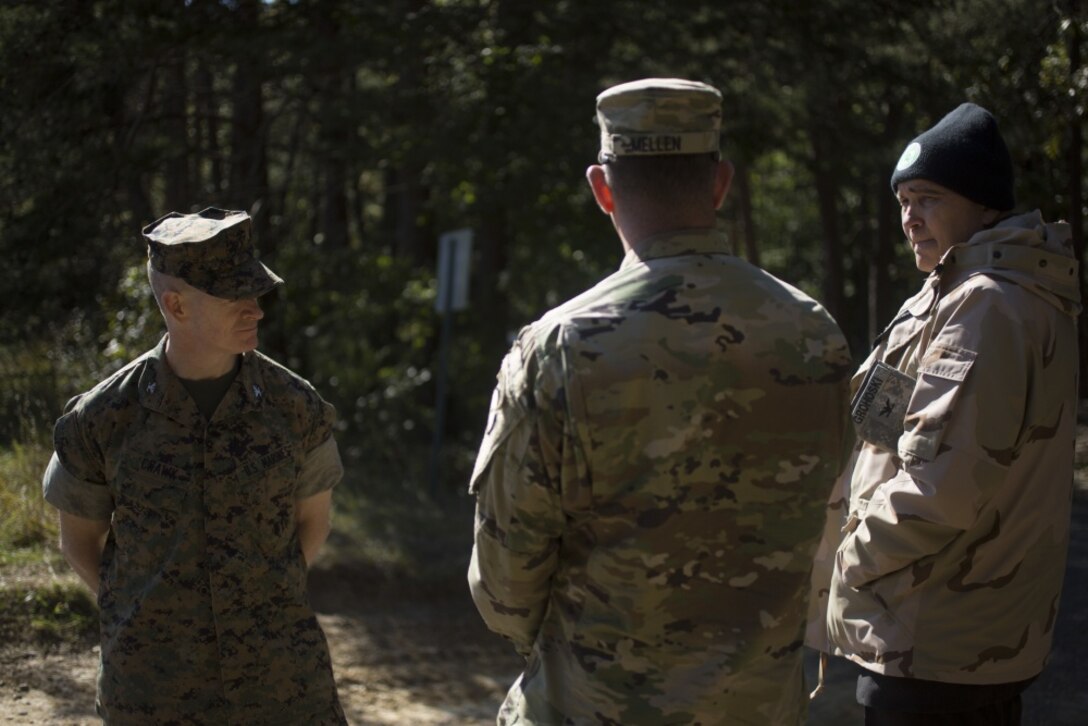Commanding Officer of Marine Corps Information Operations Center (MCIOC), informs the Distinguished Visitors (DV) the purpose of the Combined Unit Exercise (CUX) aboard Camp Upshur on Marine Corps Base Quantico, Va, Oct. 22, 2018. The CUX 18.2 was a training exercise that allowed U.S. Marines, sister services and Allied Partners to coordinate, integrate, and employ Information Related Capabilities (IRC’S) and share tactics, techniques, procedures to further interoperability for future missions and operations