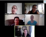 Five women participating in a virtual, computer meeting.