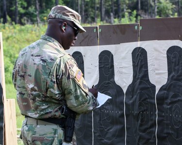 Virginia National Guard Soldiers assigned to the Virginia Beach-based 329th Regional Support Group compete with the M4 pistol during a competition Aug. 19, 2020, at Fort Pickett, Virginia.