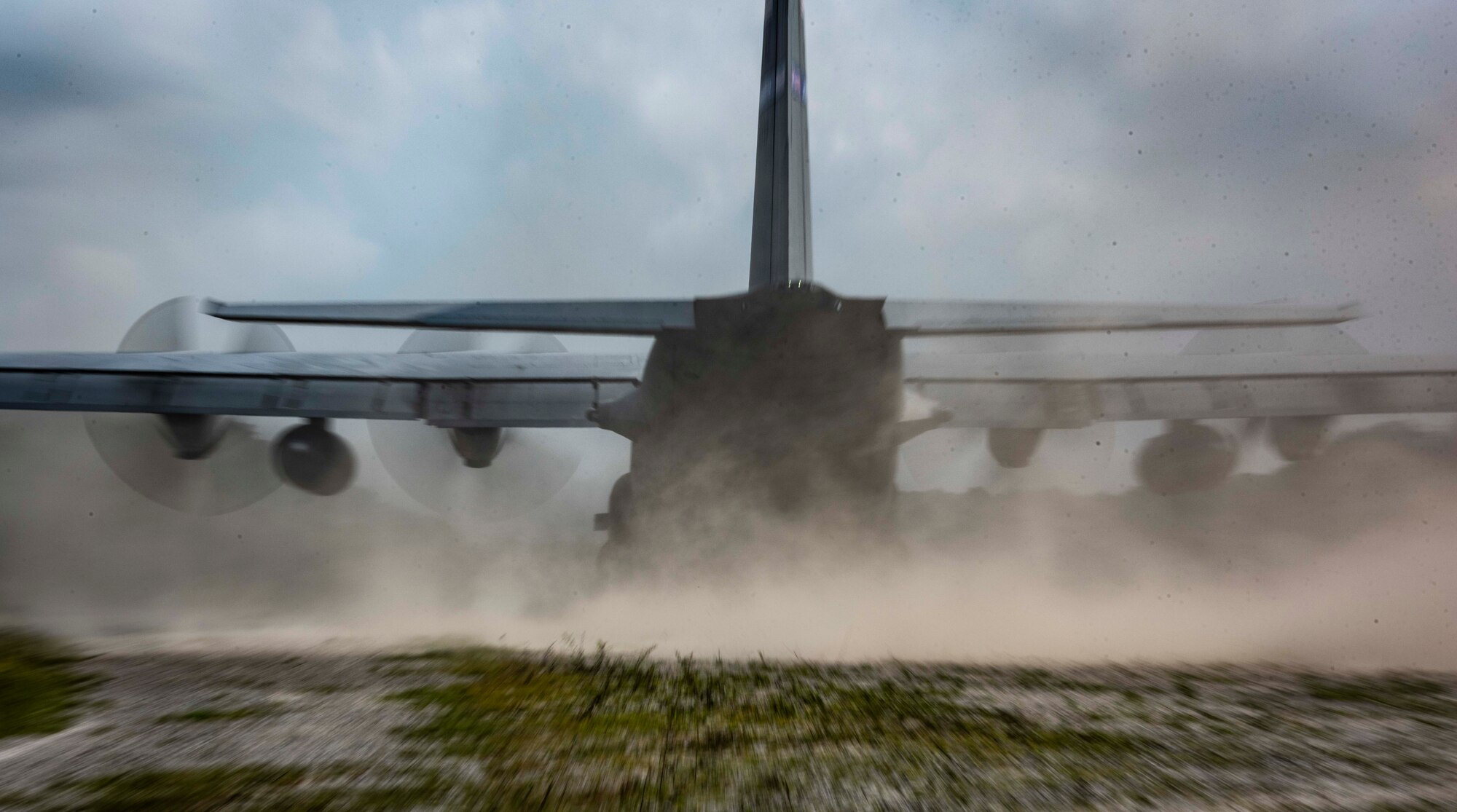 U.S. Air Force Reserve aircrew from the 908th Airlift Wing, Maxwell Air Force Base, Alabama, land a C-130H Hercules on a dirt landing zone during the distributed operations training event near Charleston, West Virginia, Aug. 25, 2020. The training event tested aircrew on their tactical combat airlift skills such as cargo airdrop, formation flights, and personnel delivery in a contested environment. There were a total of eight aircraft from various Reserve and Guard units supporting the training effort, enabling strategic depth and readiness for the force.