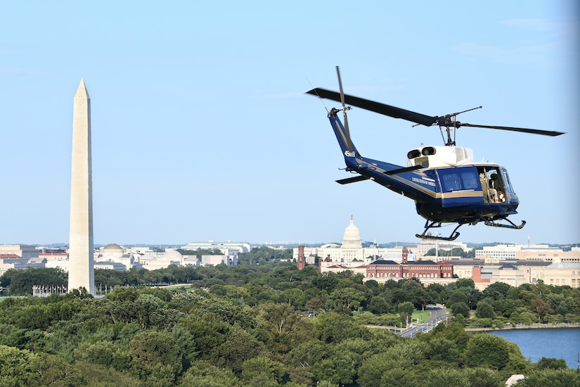 A UH-1N “Huey” from the 1st Helicopter Squadron flies over the District of Columbia, Aug. 26, 2020.