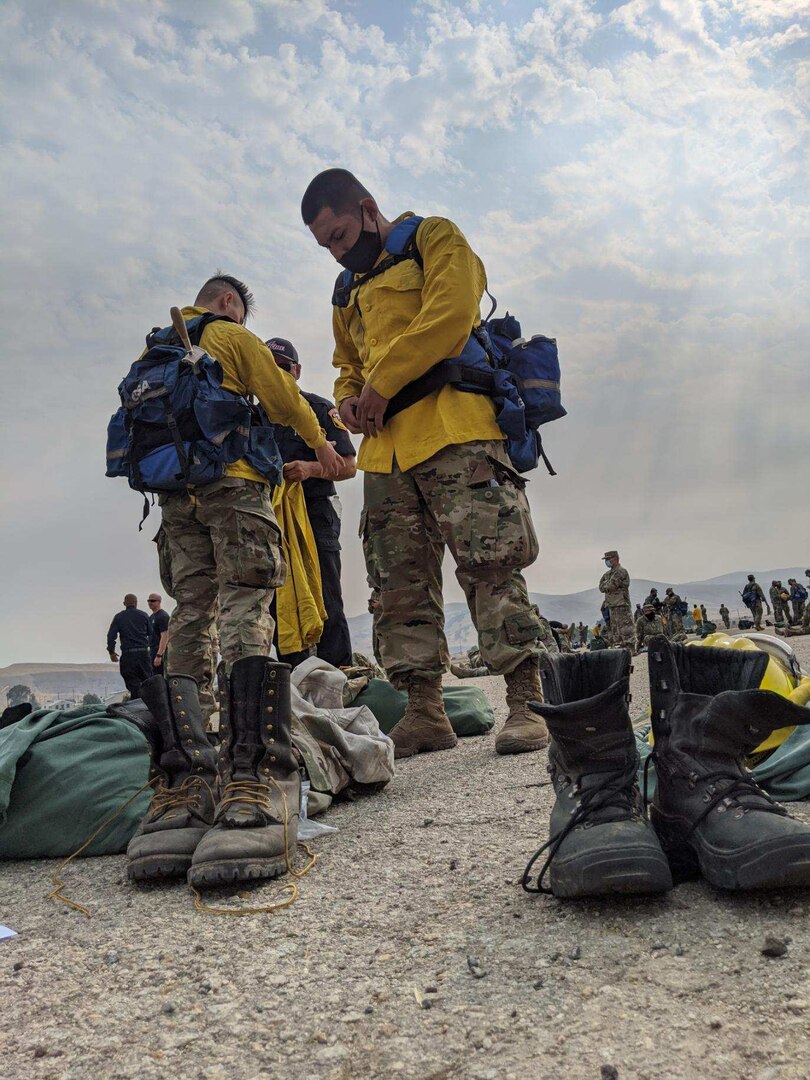 California Department of Forestry and Fire Protection issued more than 270 California National Guard Soldiers protective gear to begin hand crew training at Camp Roberts Aug. 23, 2020, to support firefighting efforts. The Guard members will supplement CAL FIRE and Cal Guard’s Joint Task Force Rattlesnake hand crews deployed to key locations such as the Carmel Fire, Jones Fire, Hills Fire and others throughout the state.