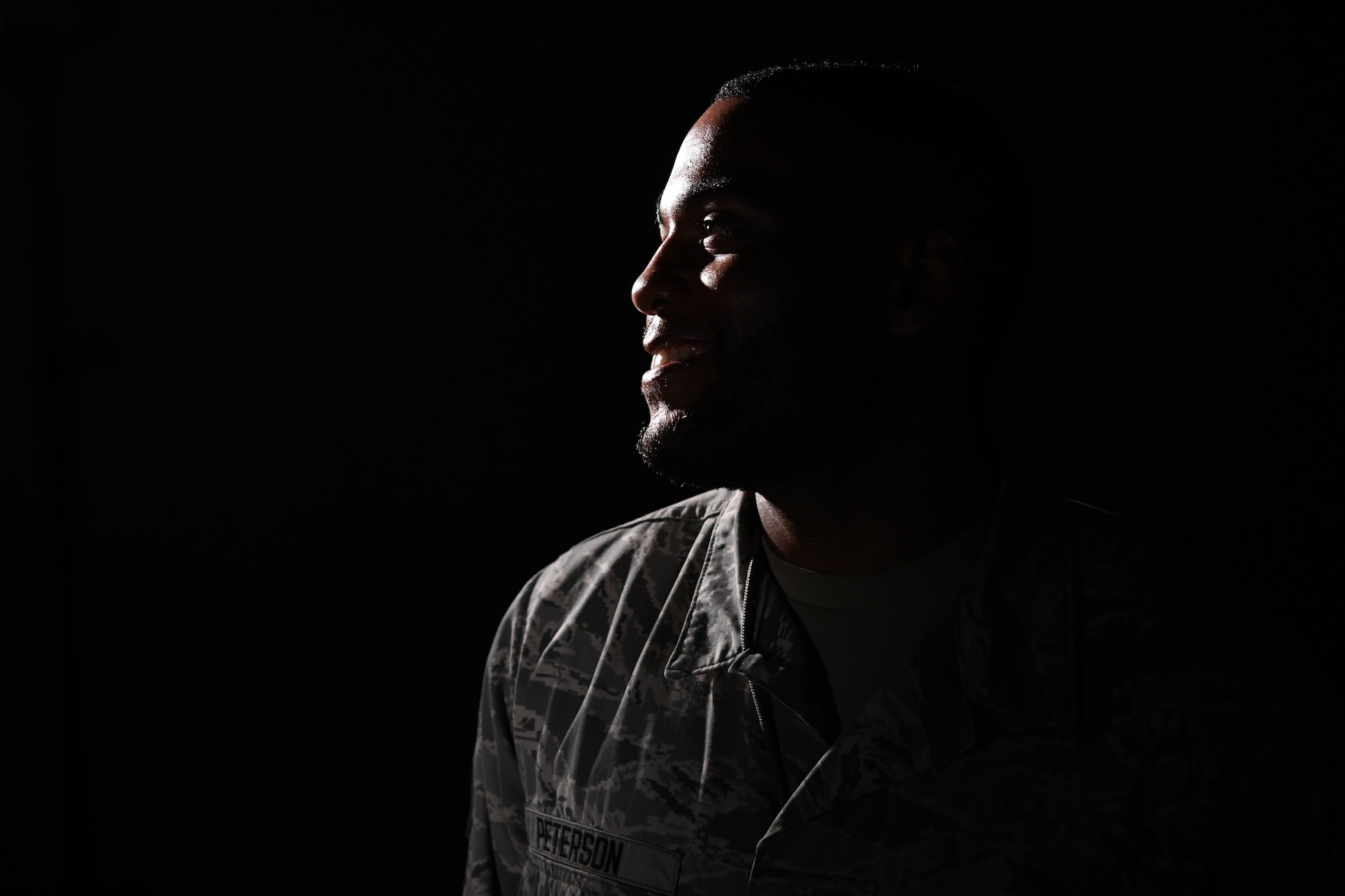 Staff Sgt. Jarrod Peterson, a 72nd Test and Evaluation Squadron software engineer, poses for a photo, July 8, 2020, at Whiteman Air Force Base, Missouri. Peterson, who is an Airman passionate to initiate change within his community, develops and maintains software for training modules in the Air Force. (U.S. Air Force photo by Staff Sgt. Sadie Colbert)