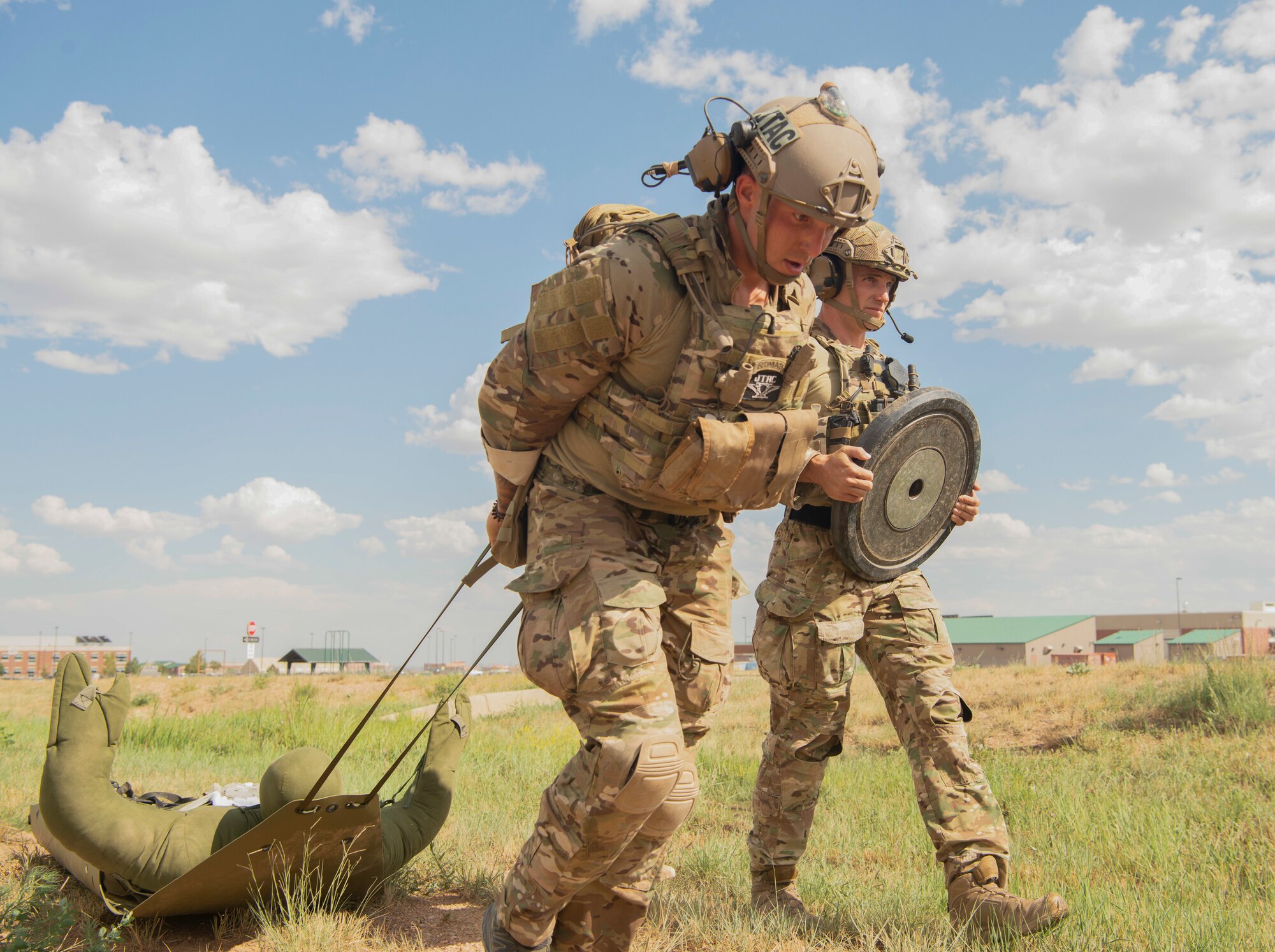 TCAP pulls sled to test Tactical Combat Casualty Care field skills