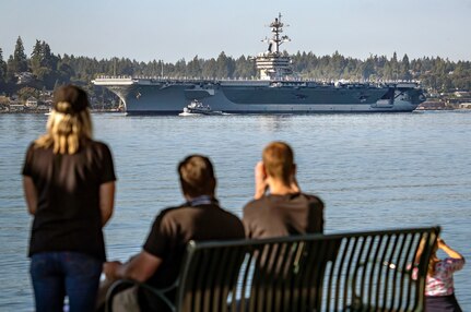 The USS Carl Vinson (CVN 70) makes its way past Point Herron Aug. 23, 2020 after departing Puget Sound Naval Shipyard & Intermediate Maintenance Facility in Bremerton, Washington. PSNS & IMF completed a docking planned incremental availability on Vinson Aug. 27, 2020, as the aircraft carrier completed sea trials enroute to San Diego, where it was homeported prior to its arrival at Naval Base Kitsap-Bremerton, Jan. 20, 2019.(PSNS & IMF photo by Scott Hansen)