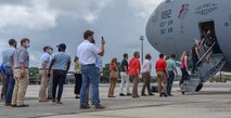Local community members, line up to board a C-17 Globemaster III static display as part of a Leadership Charleston Tour at Joint Base Charleston, S.C., Aug 20, 2020. Members of Charleston organizations such as the Charleston Metro Chamber, encourage strengthening relationships between the community and military to support service members and their families, expanding the federal footprint in the region.