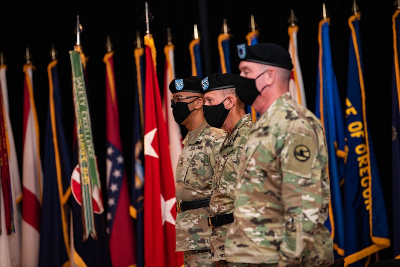 From left, Maj. Gen. A.C. Roper, the deputy commanding general of the U.S. Army Reserve; Maj. Gen. Steven W. Ainsworth, the outgoing commander of the 84th Training Command; and Ainsworth’s senior enlisted leader Command Sgt. Maj. Lawrence G. May, participate in Ainsworth’s relinquishment-of-command and retirement ceremonies at Fort Knox, Ky., Aug. 22, 2020.