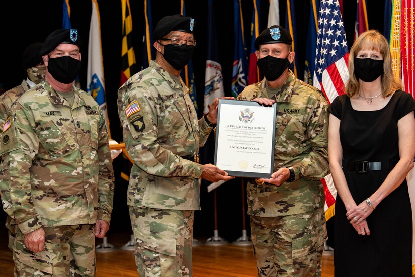 From left, Command Sgt. Maj. Lawrence G. May, the 84th Training Command’s senior enlisted leader; Maj. Gen. A.C. Roper, the deputy commanding general of the U.S. Army Reserve; Maj. Gen. Steven W. Ainsworth, the outgoing commander of the 84th, and Susanne, his wife, participate in Ainsworth’s relinquishment-of-command and retirement ceremonies at Fort Knox, Ky., Aug. 22, 2020.