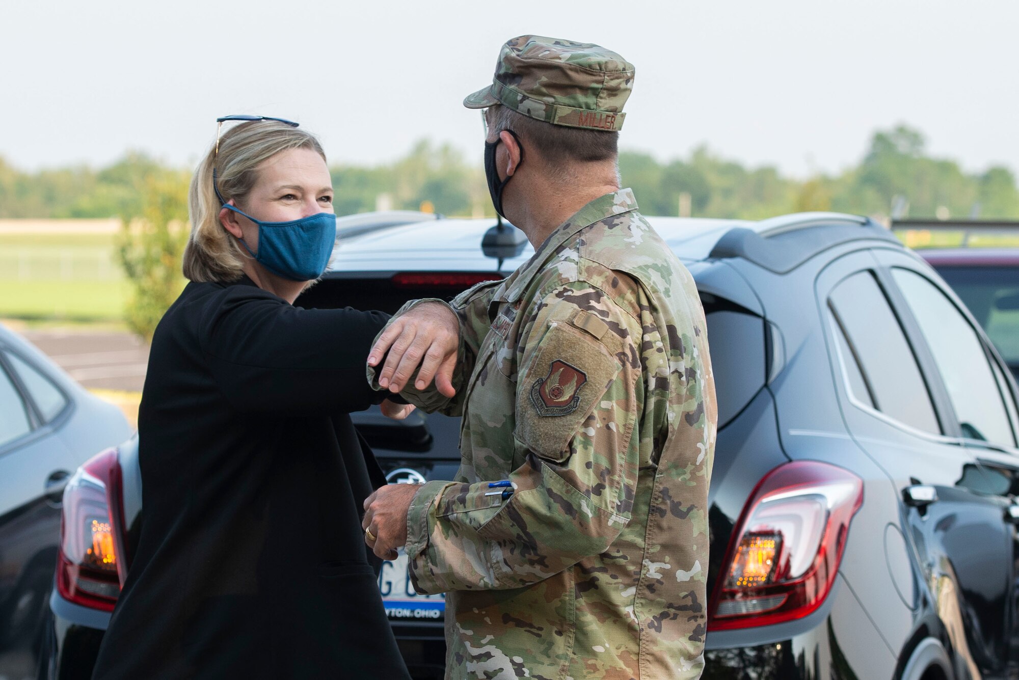 Caption: Col. Patrick Miller, 88th Air Base Wing commander, greets City of Dayton Mayor Nan Whaley upon her arrival at the National Museum of the United States Air Force, Wright-Patterson Air Force Base, Aug. 25. Whaley visited the museum to record her keynote address to be aired during the annual Women’s Equality Day event. (U.S. Air Force photo by Wesley Farnsworth)