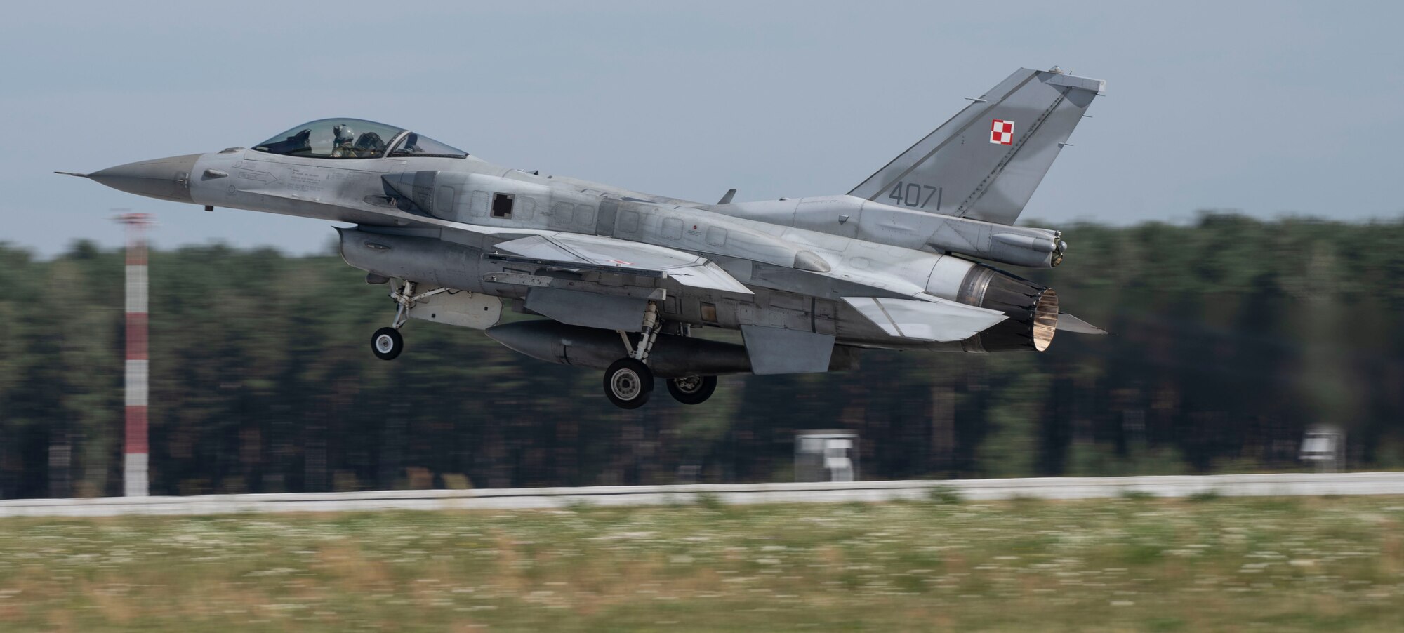 A Polish air force F-16, assigned to the 32nd Tactical Air Base, takes off at Łask Air Base, Poland, August 20, 2020. Aviation Detachment Rotation will be one of the largest exercises performed at the 32nd TAB, where there will be focus on missions such as Large Force Deployments, Defensive Counter Air and Suppression of Enemy Air Defenses. (U.S. Air Force photo by Senior Airman Melody W. Howley)