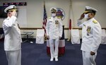 YOKOSUKA, Japan (Aug. 28, 2020) Rear Adm. James “Jimmy” Pitts, a native of Milton, Florida, relinquishes command to Rear Adm. Leonard Dollaga, a native of Vallejo, California, during Commander, Submarine Group 7’s (CSG7) change of command ceremony at Fluckey Hall. Vice Adm. William Merz, Commander, U.S. 7th Fleet presided over the ceremony. CSG7 directs submarine activities throughout the Western Pacific, Indian Ocean and Arabian Sea; two forward-deployed submarine tenders and four attack submarines homeported in Guam; five surveillance towed array sensor system vessels and three oceanographic survey vessels when tasked for theater anti-submarine warfare operations.