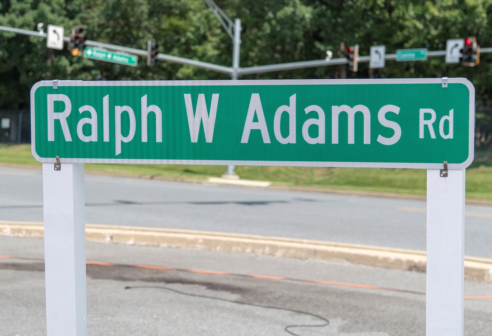 Ralph W Adams Road sign